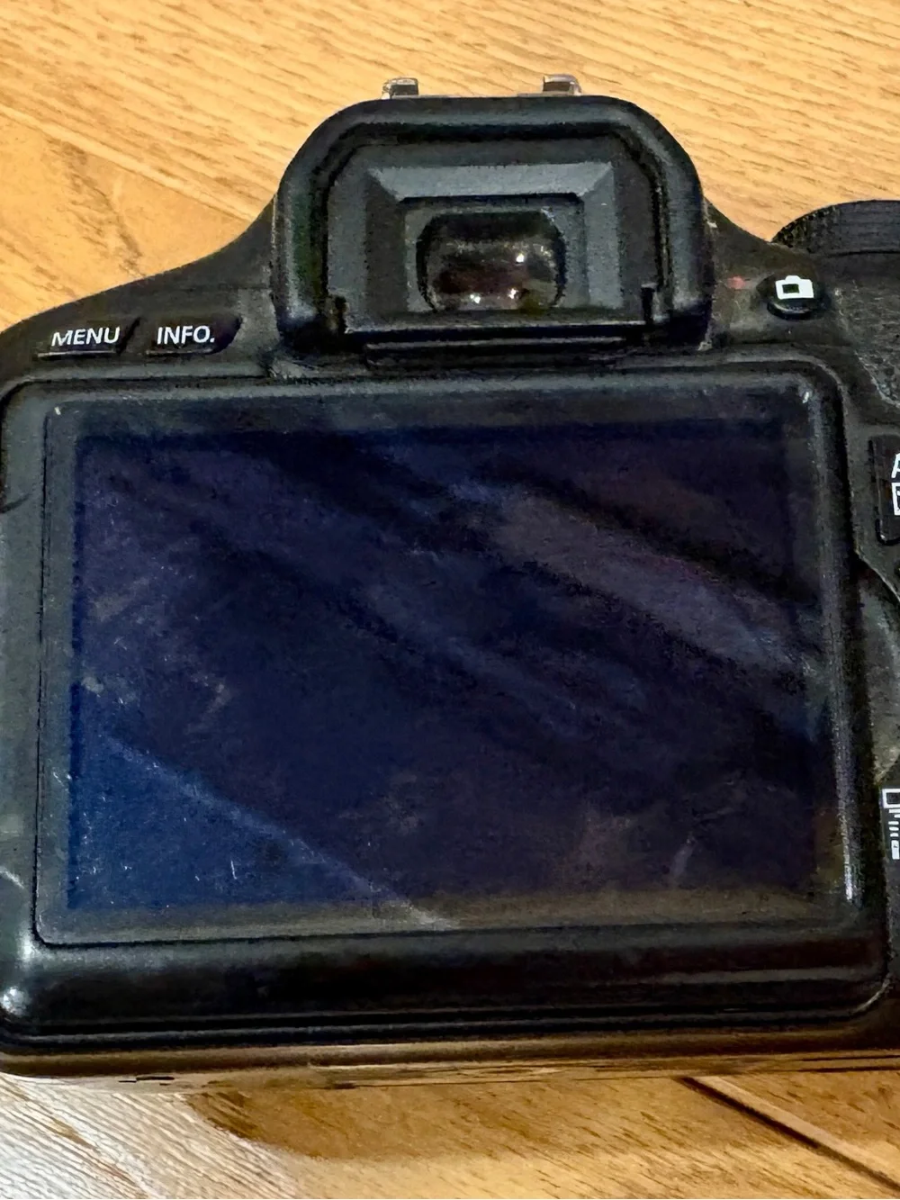 Canon DSLR Camera Body in Black with Black Strap and Red Trim